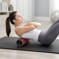 RecoverRoll™ Adjustable Travel Foam Roller shown in everyday use
