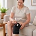 KneeRevive™ Pro Infrared Heat Massager shown in everyday use