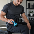 DeepTissue Mini™ Pocket Massage Gun shown in everyday use