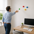 StressEase™ Sticky Wall Ball shown in everyday use