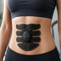 CoreTone™ EMS Muscle Trainer shown in everyday use