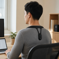 PostureCoach™ Smart Posture Trainer shown in everyday use