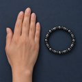 EarthCalm™ Magnetic Stone Bracelet included items and scale